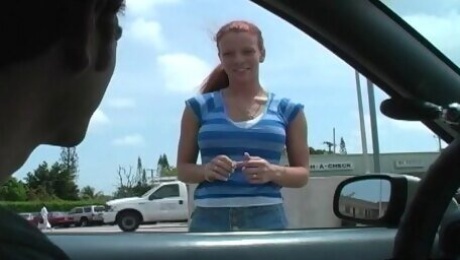 Crazy redhead Brandi Mae gives head in the back of a car