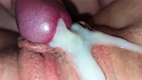 Cock rubbing pussy with a huge cumshot very close up